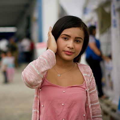 A girl outside a Plan International safe space to support Venezuelan migrants.