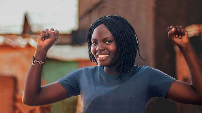 Girl with arms raised