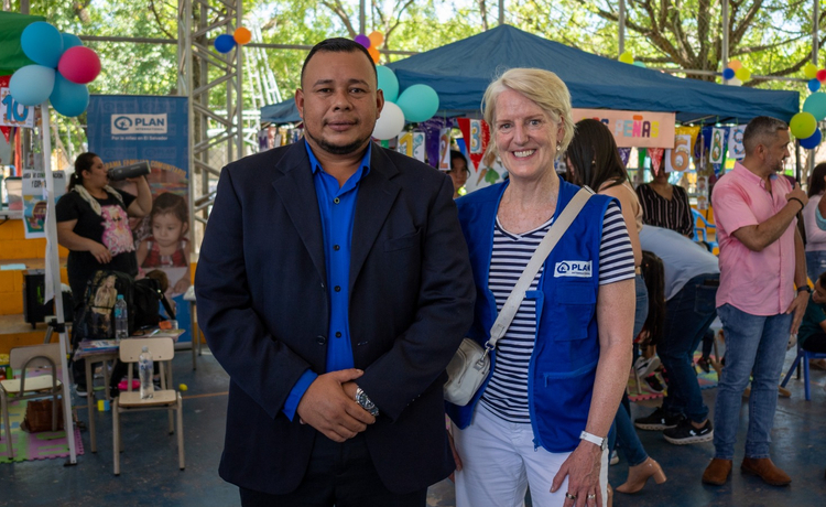 Plan Canada president and CEO Lindsay Glassco with Martín Leiva, who was sponsored as a child, is now a mayor in the Chalatenango region