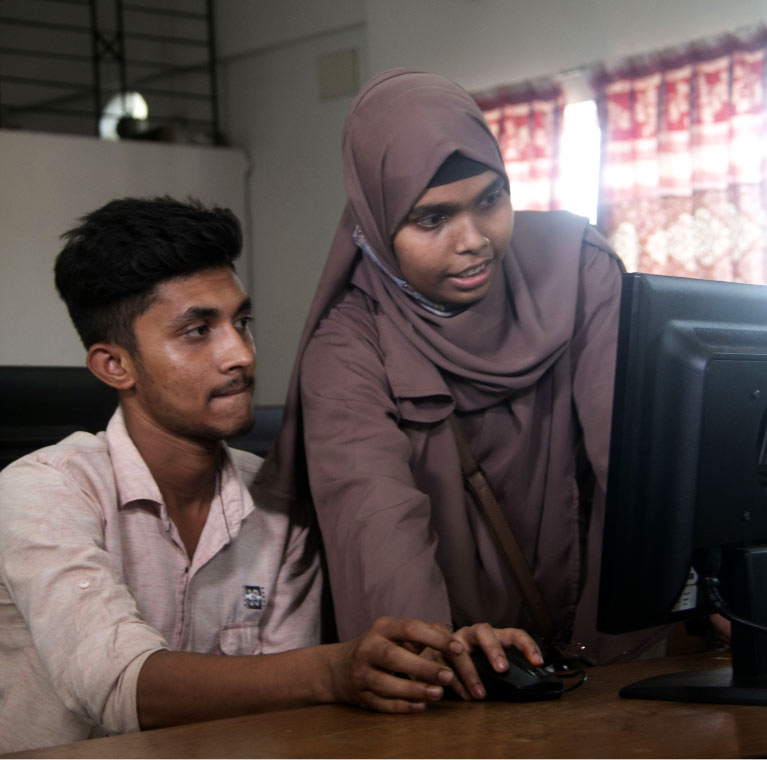 Khadija at a computer 