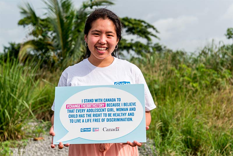 Girl holding Show sign