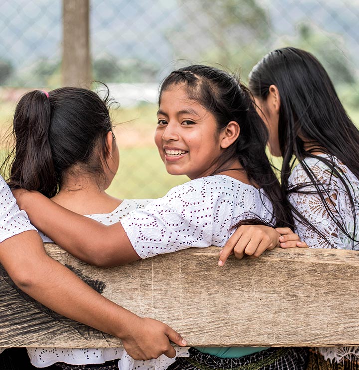 Girls sitting on a bench