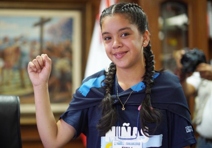 Girl with raised arm