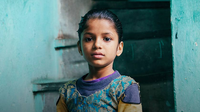 A smiling girl looking at the camera