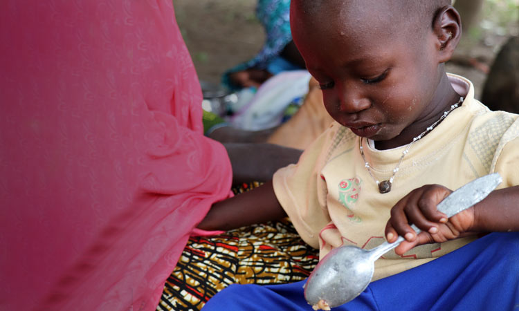 Child eating from a bowl