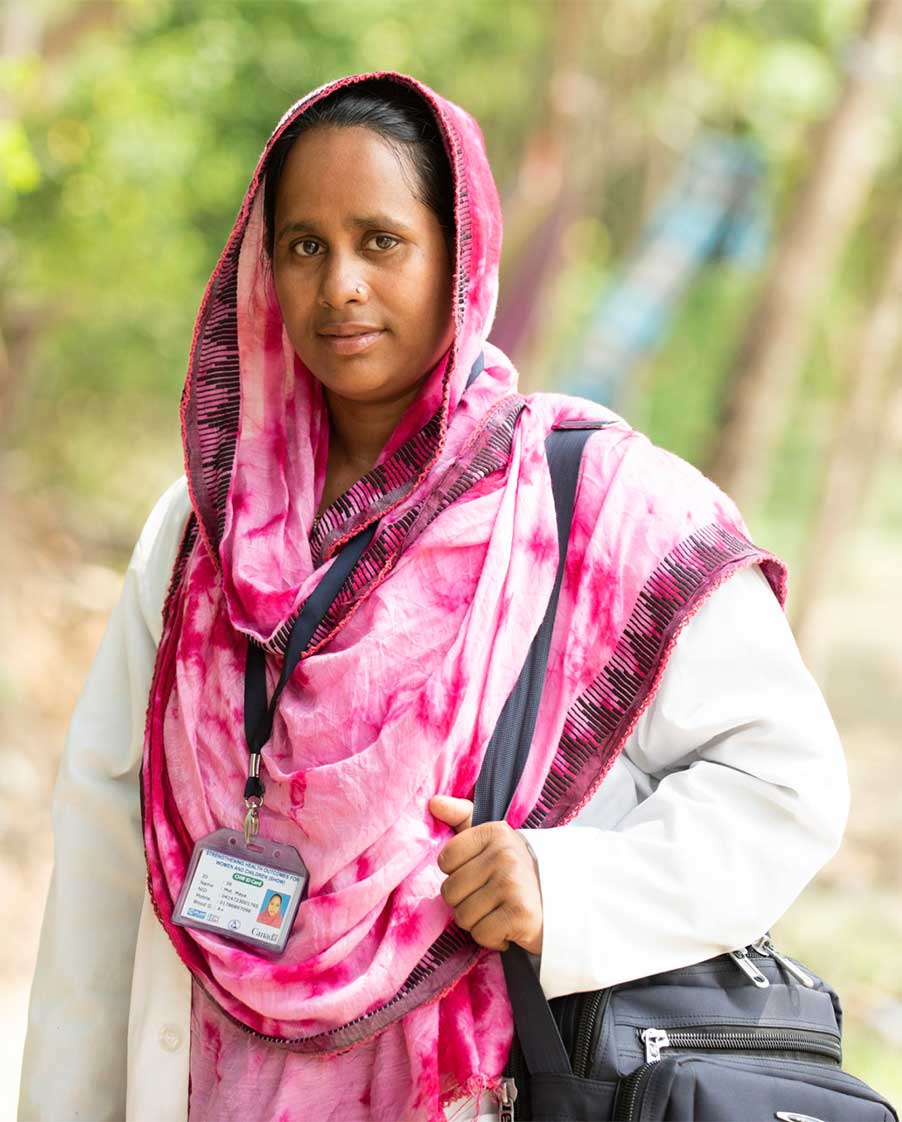 Bangladeshi couple read health pamphlet