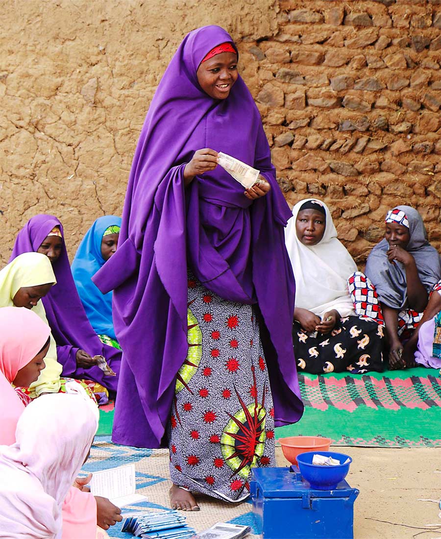 Woman at savings and loan meeting