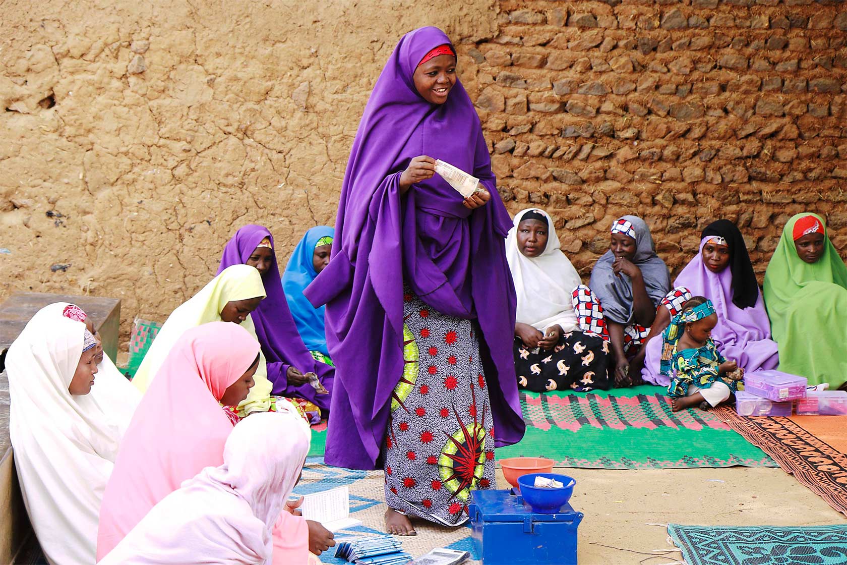 Woman at savings and loan meeting