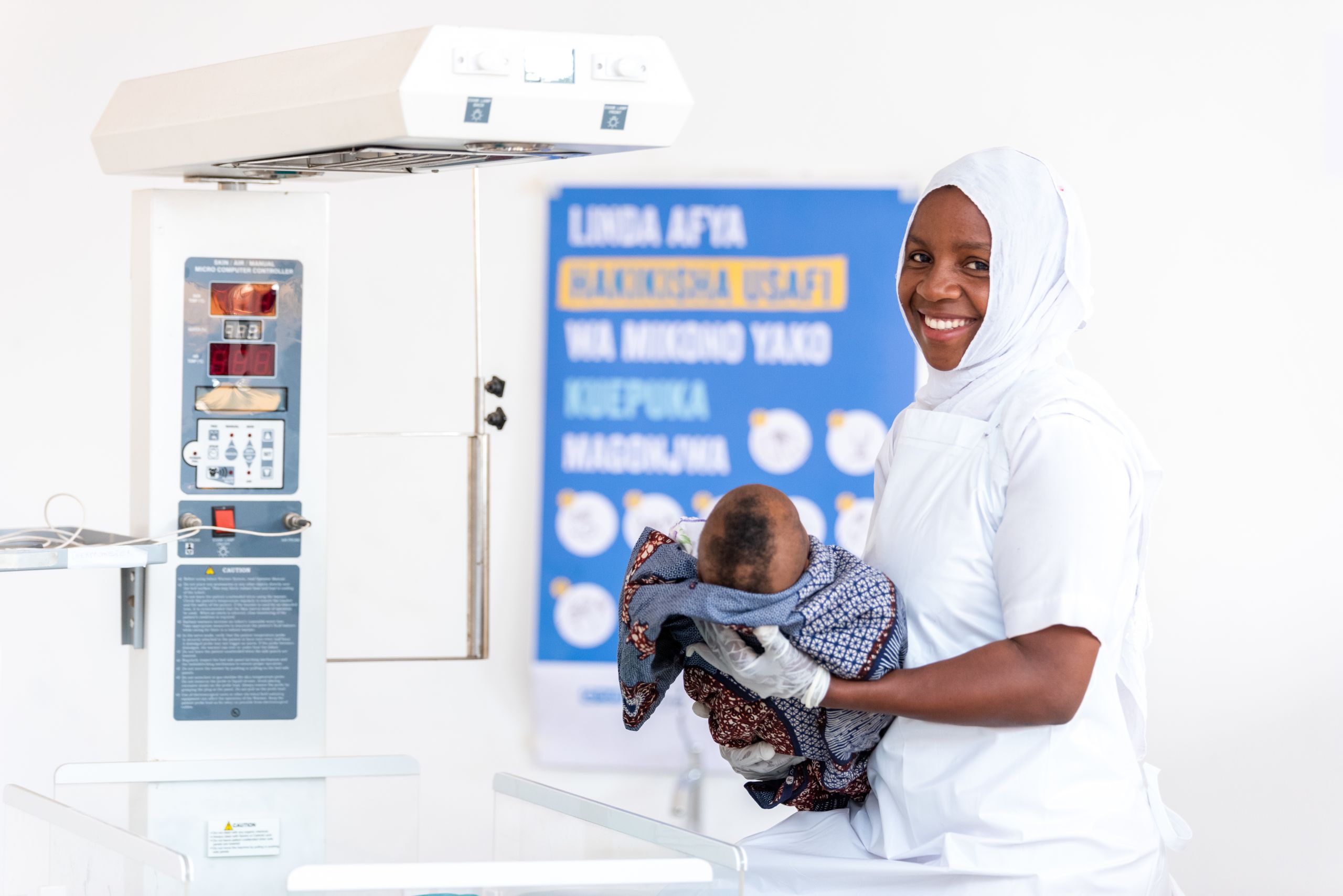 Nurse holding a baby