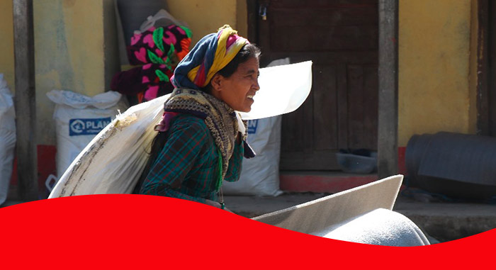 Woman carrying emergency supplies