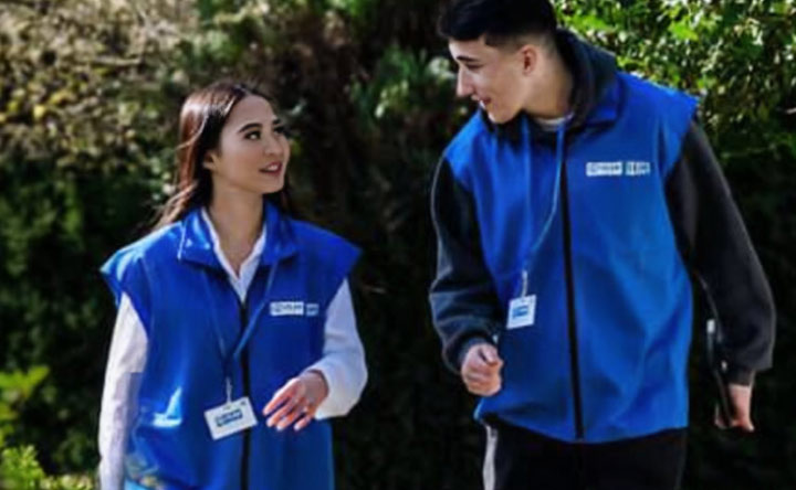 Two Plan International Canada door to door canvassars