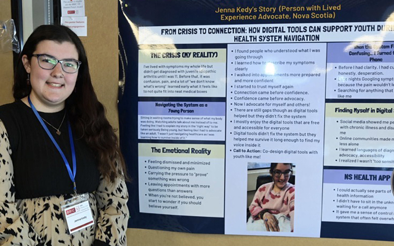 A girl stands next to a board displaying a presentation on mental health awareness.