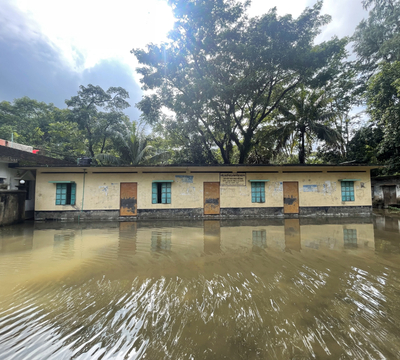 First image showing the outside of a flooded school