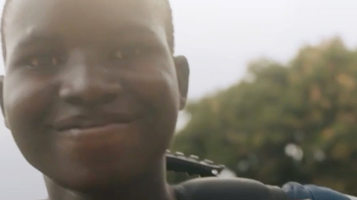 A smiling girl looking at the camera