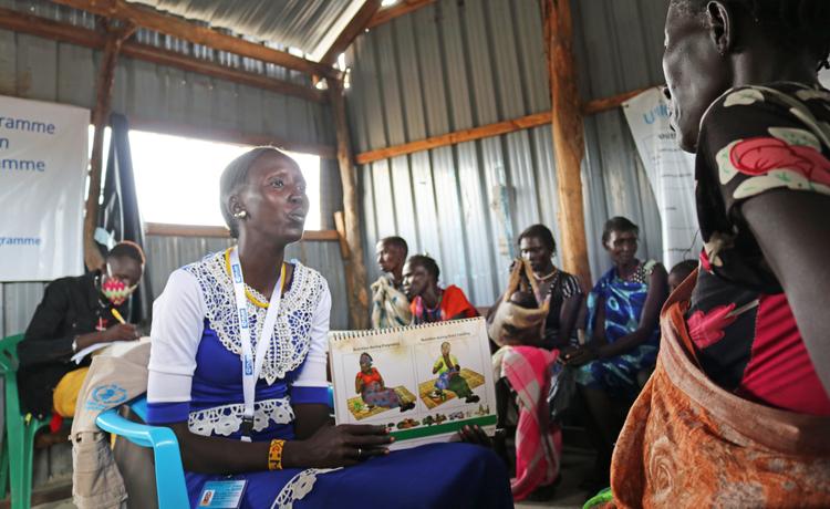 Judisa, a community nutrition worker, shares with mothers across communities in South Sudan how to feed their children a healthy diets.