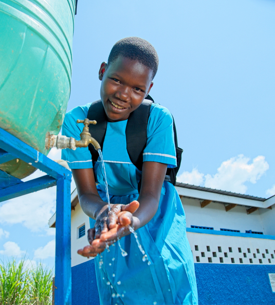 Boy washing hands