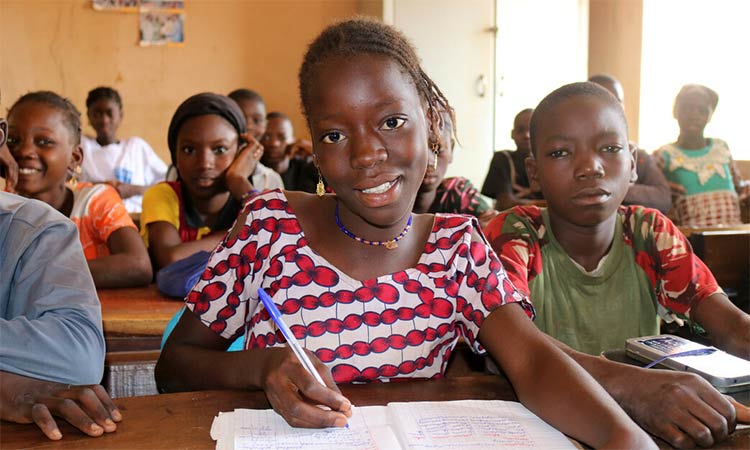 Girl learning in a classroom