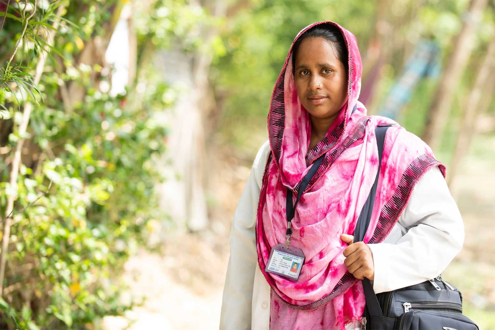 Bangladeshi couple read health pamphlet