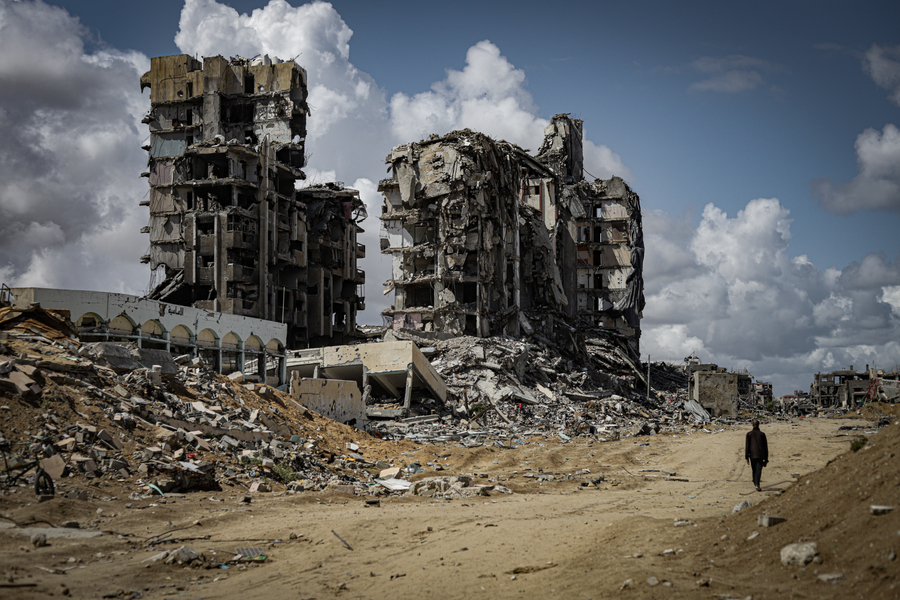 Rubble and debris of demolished buildings on Al-Mukhabarat Street in the northern Gaza Strip after airstrikes