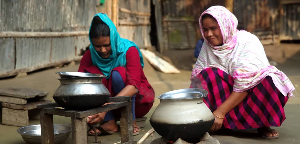 Mother and daughter cooking