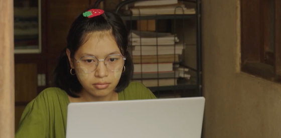 a young girl on a computer