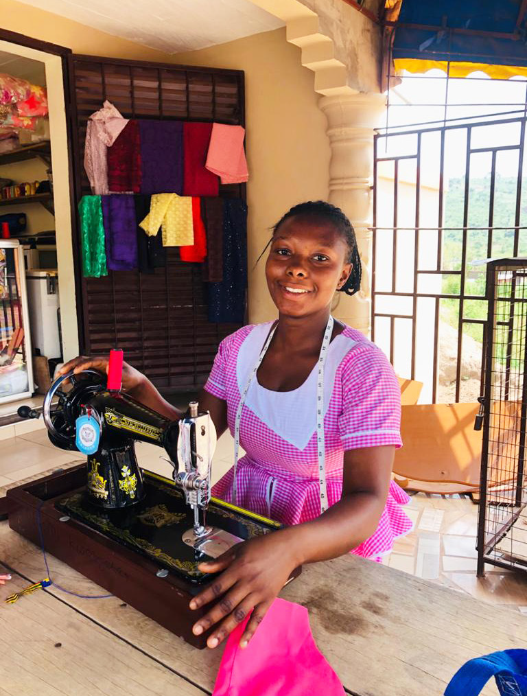Naomi, 28, took a three-week training course and apprenticed with a professional seamstrees in her community to complete her training.