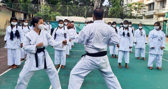 Two black belts demonstrate moves to girls practising karate and self-defence in a class provided through Plan International Canada’s Combatting Early Marriage in Bangladesh project, run in partnership with the Government of Canada and Because I am a Girl supporters.