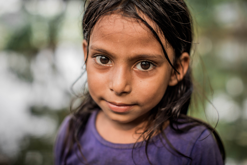 A girl looking straight at the camera.