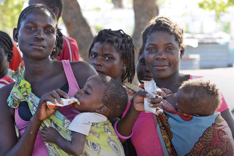 A group of new moms who participated in the Healthy Women and Girls project in Mozambique.