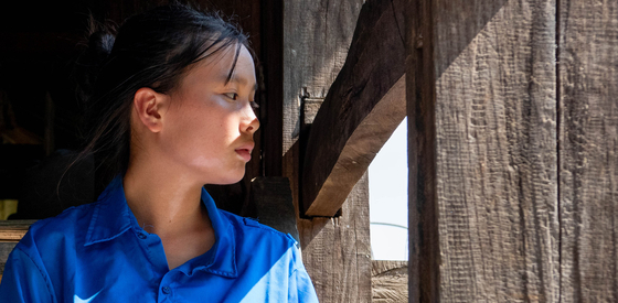 Young girl looking off into the distance